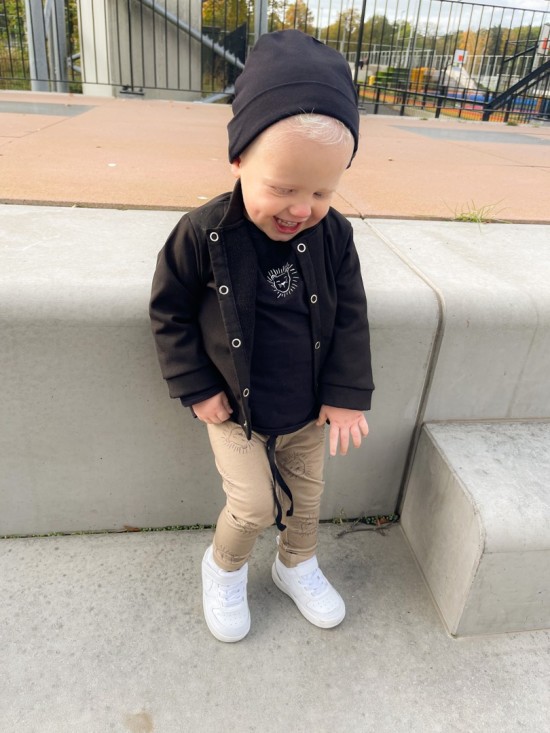 Babykleding - Lenn lion broek bruingroen logo